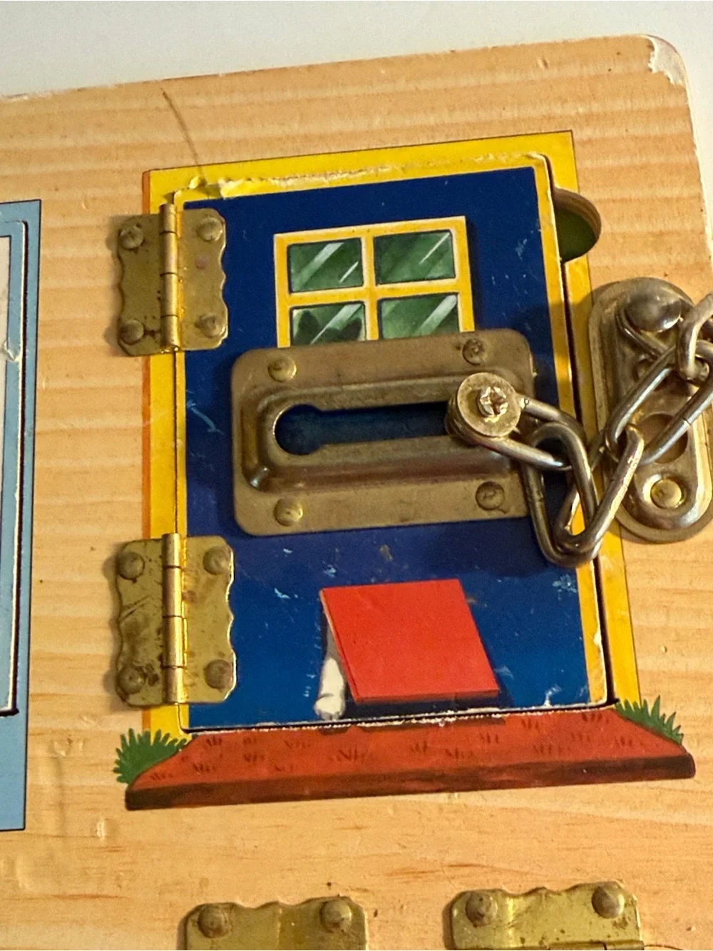 Melissa & Doug Wooden Latches Board - Red, Blue, Yellow, Green, Brown